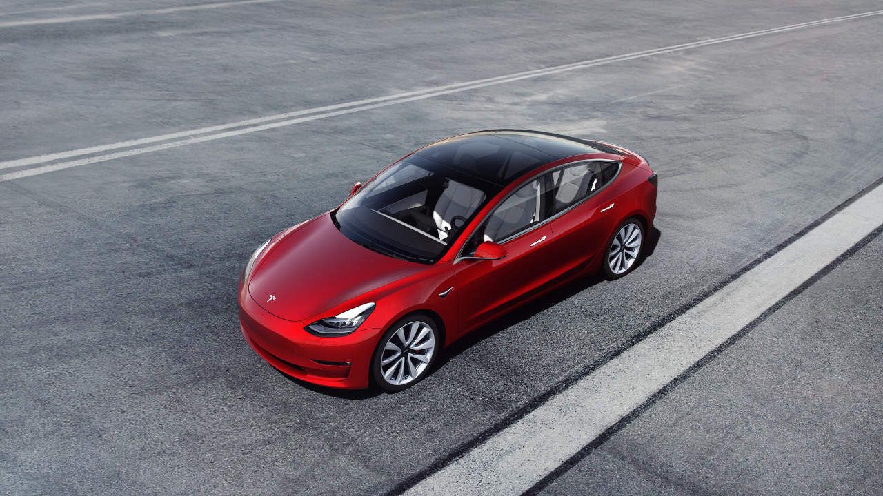 Tesla Model 3 Performance Red Above Tarmac